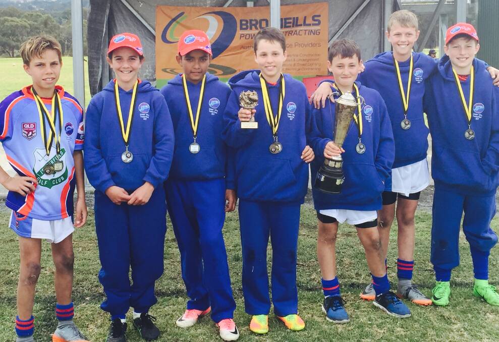 Eight Tenterfield Junior Tigers were selected for the Macintyre team which came runner-up at the carnival, including (from left) Gerry McGrady, Bonnie Zappa, Jayden Swan, Fletcher Koch, Tobi Leiberman, Jackson O'Neill, Jakeb Gibbins, and Coby Roots (who was absent from the photo.)