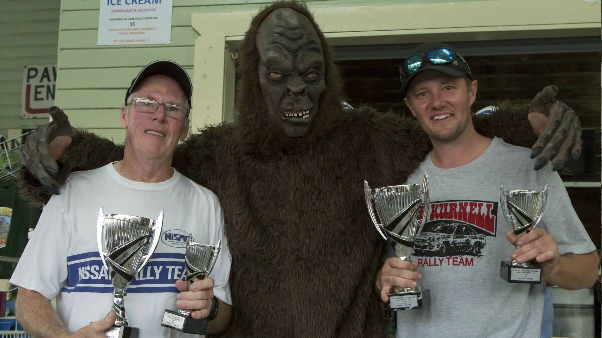 Woodenbong Yowie presents their trophies to the winners of the Yowie Country Rally, Alan Stean (co-driver) and Clayton Hoy (driver). Photo by CH Images.