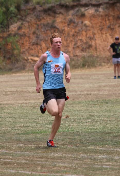 Lachlan Dorward strides out at the Downs South West regional Little Athletics championships.