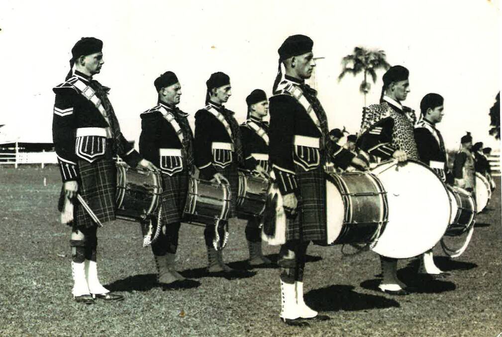 Tall and strong: A 1950 photo of the Tenterfield Pipe Band featuring (at back) Bob Henderson, Harry Flynn, Lester Waugh and Terry Chapman, and (at front) Audley Smith, Gordon Kay and Gordon Corney.