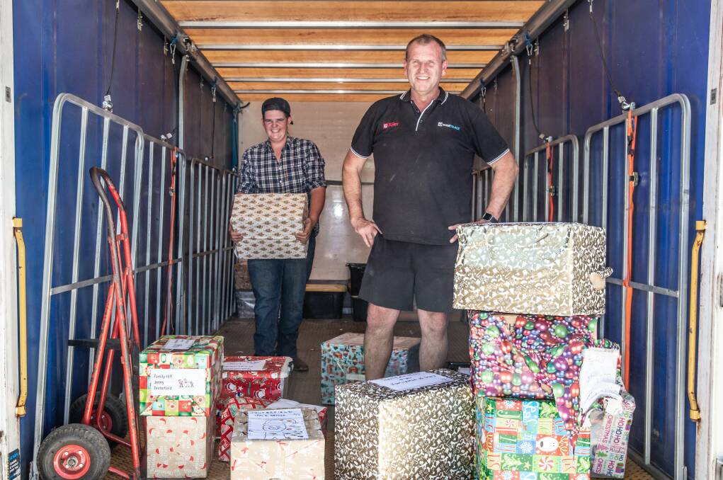 Jack and Gavin Hayman borrowed the company truck and left Gosford at 3am for the drop-offs. Photo by Peter Reid.
