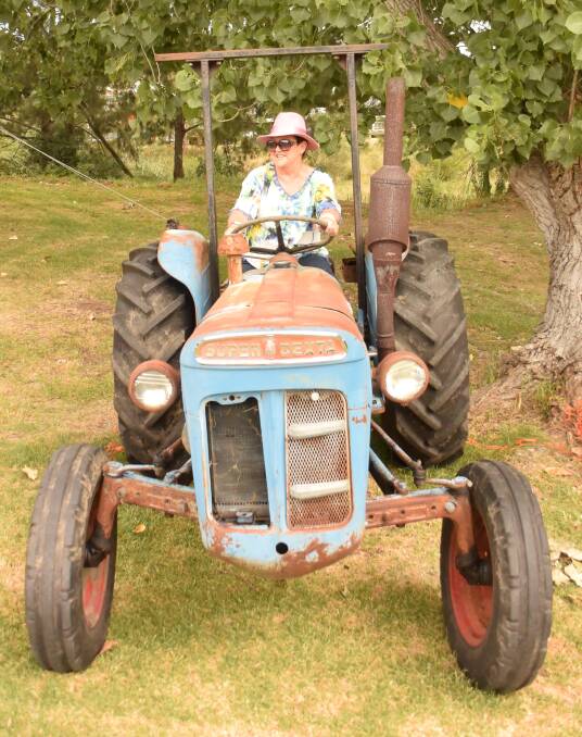 Noelene Faint was behind the wheel of her vintage tractor in the grand parade at the 2017 Tenterfield Show.
