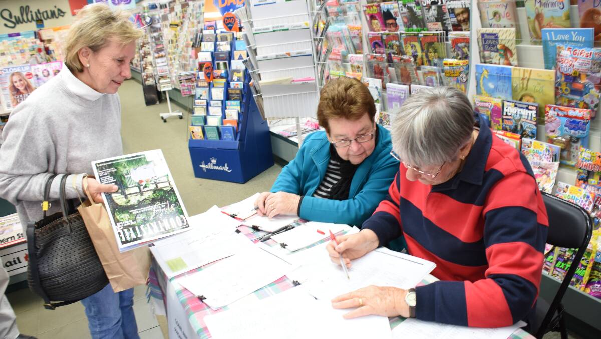 Fay McCowen and Phyllis Burton were on hand at Sullivan's Newsagency for Jenny McDougall to update her phone book entry