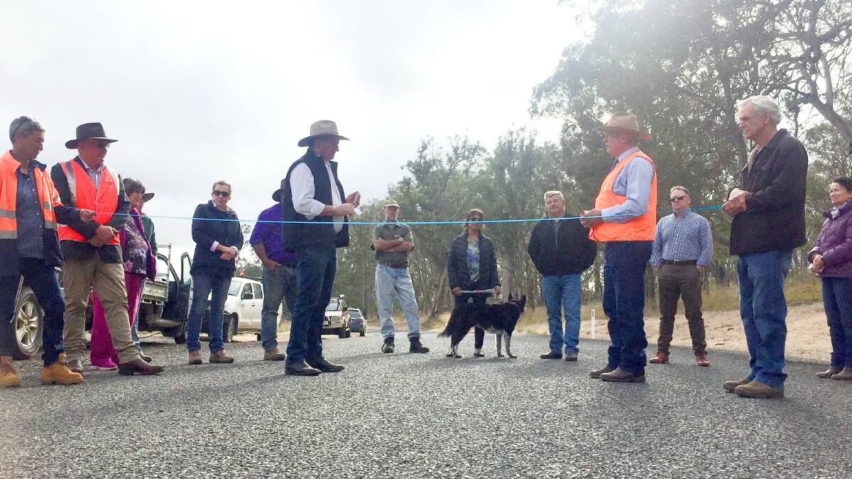 MP Barnaby Joyce and Tenterfield mayor Peter Petty cut the ribbon on a new section of sealed Mt Lindesay Road at Wylie Creek.
