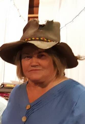 Colleen Taylor wasn't about to let anyone else win the bidding for this character-filled hat.