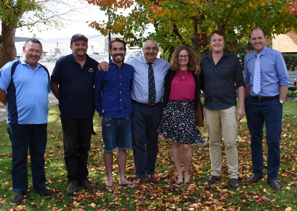 MP Thomas George (centre) is flanked by Paul Quinn, Kevin Santin, Matt Sing, Caitlin Reid and Josh Moylan who all had a hand in getting the festival underway, along with Nationals pre-selected candidate Austin Curtin.