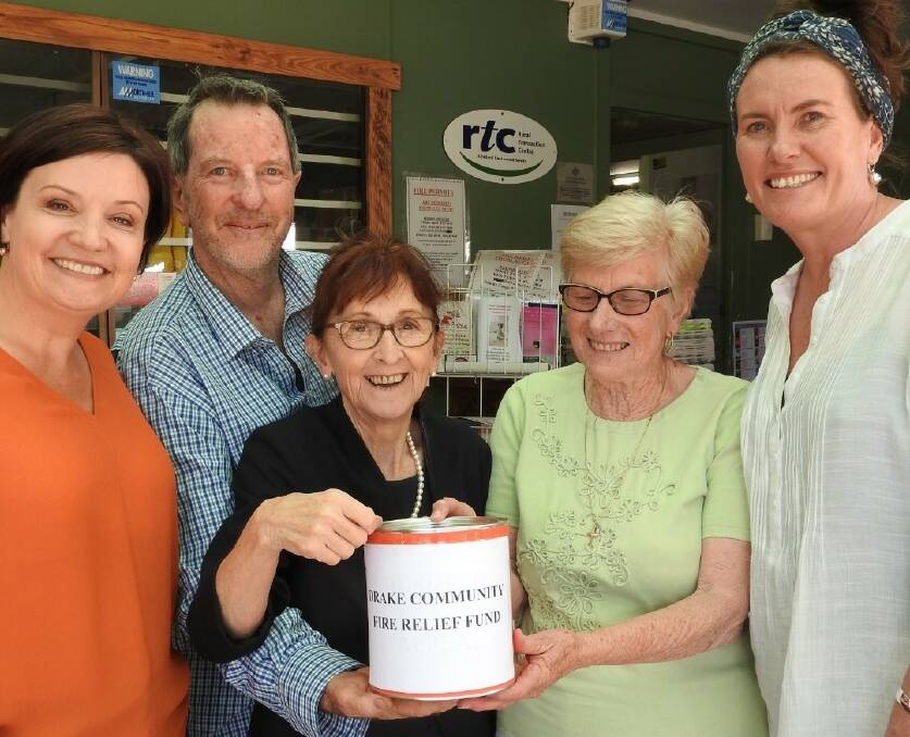 NSW Opposition Leader Jodi McKay, Lismore MP Janelle Saffin and NSW Shadow Minister for Emergency Services Trish Doyle donate to the Drake Community Fire Relief Fund. Looking on are DVRC volunteers Lathan Gillies and Margaret Smith.