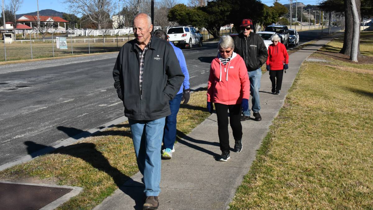 Tom Short leads off Wednesday's socially-distanced Willow Walkers, with matriarch Norma Ovenden bringing up the rear.