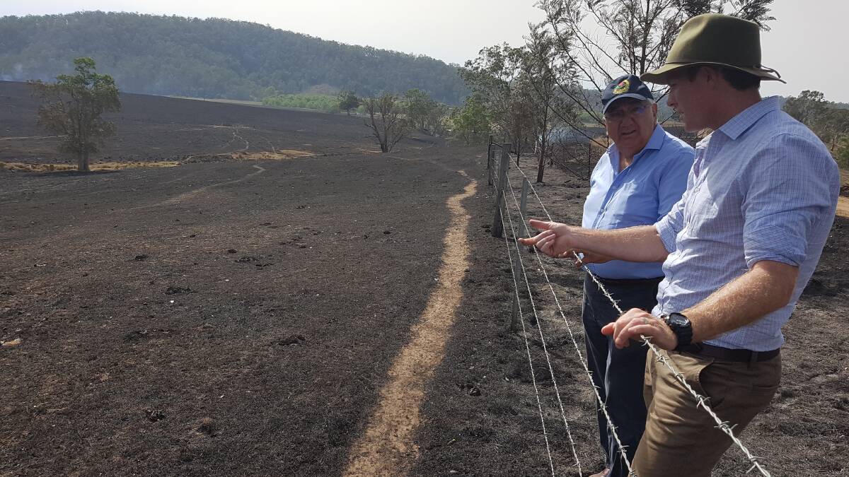 Not much feed left: MP Thomas George and Nationals candidate Austin Curtin spent time in Tabulam seeing the devastation first-hand.