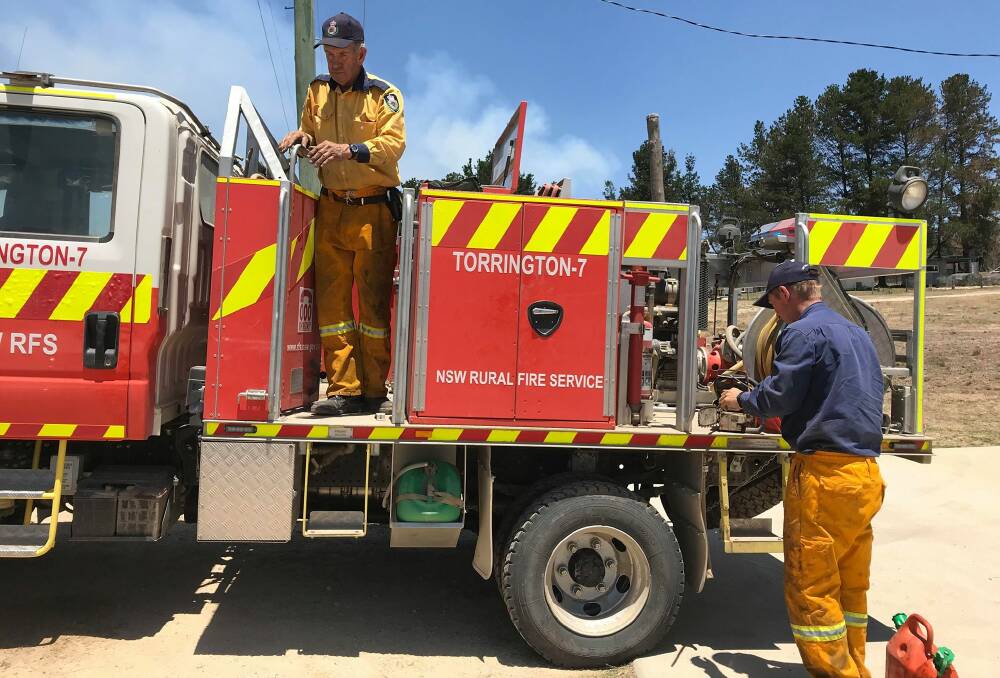 MP Janelle Saffin met up with Torrington firefighters and residents following the November bushfire, and is now pushing for practical help for those with property damage.
