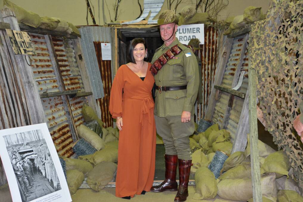 The 2018 Wallangarra Dugout recreated by Tenterfield Shire Council's ANZAC Centenary Steering Committee and a team of volunteers in Tenterfield Memorial Hall for Remembrance Day. Pictured are Bianca and Scott Rhodes who attended the Dining In event in the hall.