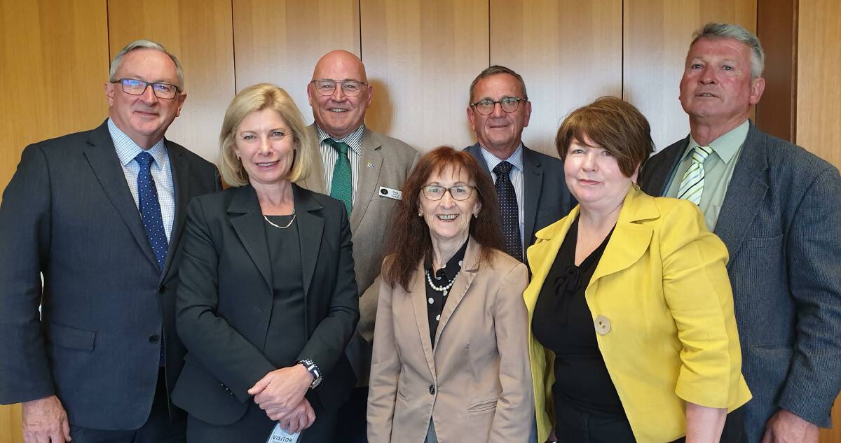 Pictured (from left) with NSW health minister Brad Hazzard are Susan Heyman, Greg Sauer, Janelle Saffin, Allan McKenzie, Jo-anne McKeough and Peter Petty.