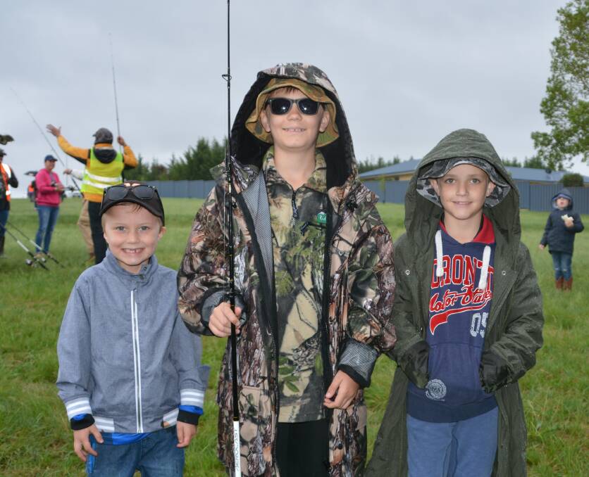 Ned Campbell, Max Keep and Ryker Montague were at the Gone Fishing Day in 2017. Organiser Michael Davey of OzFish said we'll be dancing in the mud if it rains this year.