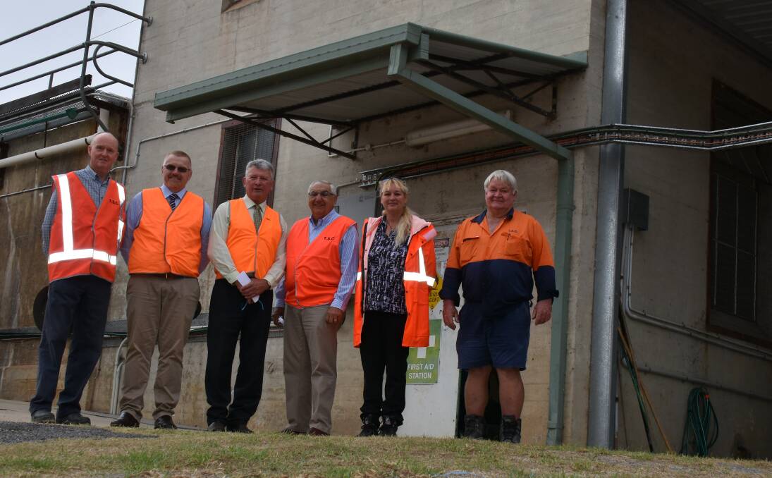 (From left) Tenterfield Business Chamber's Chris Jones, council chief executive Terry Dodds, mayor Peter Petty, then-MP Thomas George, waste and water manager Gillian Marchant and senior services operator John Edmonds at the announcement of part-funding for a new water treatment plant back in March.