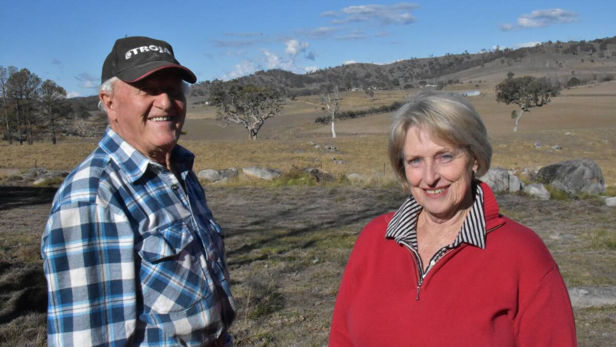 Des Roberts and Lorraine Rhodes-Roberts have no qualms about having the solar farm as a neighbour. The array will occupy the hilltop in the distance between them, and wrap around the north-eastern corner of their property.