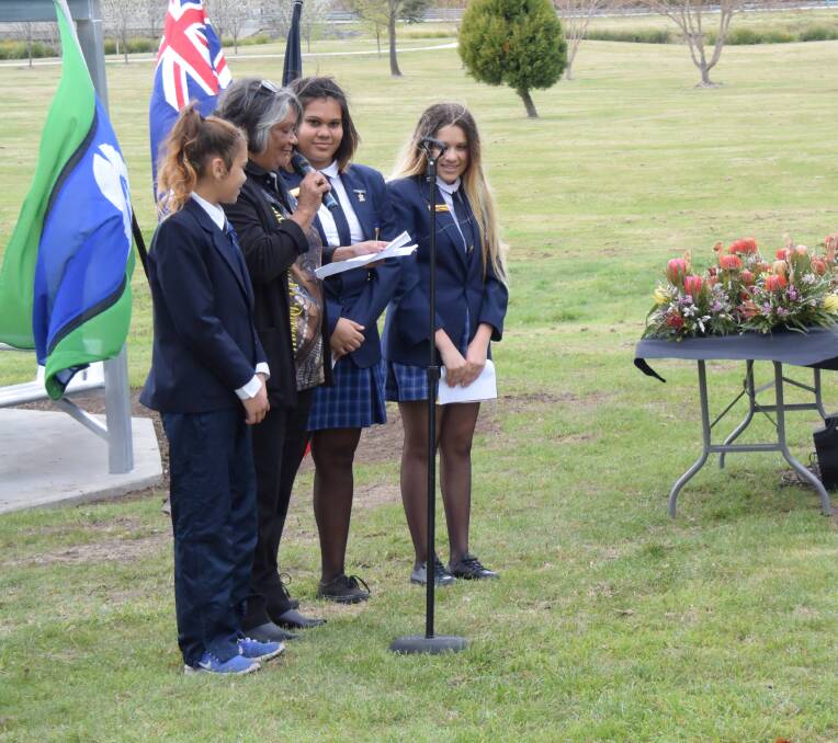 WELCOME: Helen Duroux, with Georgie Duroux and Ella and Merinda McIntosh, spoke in her native Kamilaroi language.