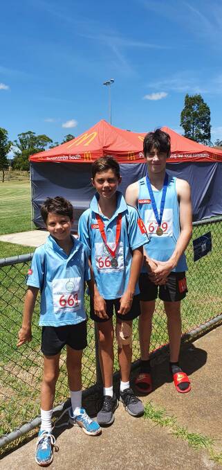 MEDAL HAUL: Digby and Hunter Hennessy, and Jake Murphy at the Downs and South West Regional Championships. Photo: Supplied