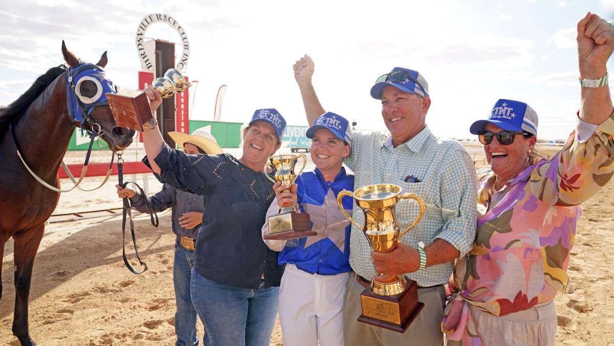 Winners are grinners: Birdsville Cup winner Echo Point with Toni Austin representing her husband, trainer Todd Austin, jockey Brook Richardson, and part owners Will and Marcelle Chandler, Barcaldine.