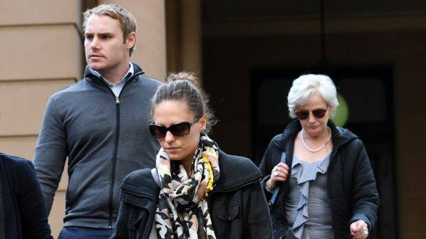Adam Cranston's wife, Elizabeth (centre), mother Robyn (right) and brother Josh leave Sydney Central Local Court on Thursday. Photo: AAP