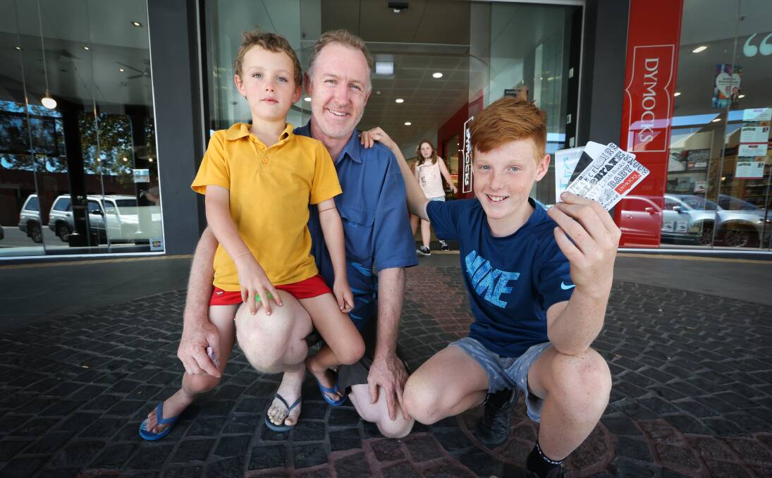 STOKED: Dave Bonnor, pictured with his sons Harry, 7, and Jack, 12, is pleased to hear expiry dates for gift cards sold in NSW have been extended. Picture: KYLIE ESLER 
