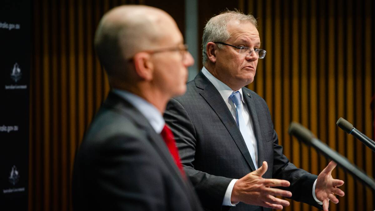 Prime Minister Scott Morrison with acting chief health officer, Paul Kelly. Picture: Elesa Kurtz 