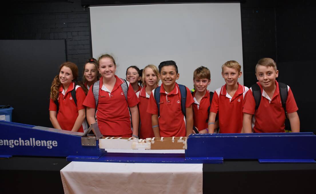 Students from Inverell Public School working on their bridge in progress for the gold fever challenge during the 2018 event.