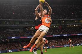 GWS coach Adam Kingsley is backing his skipper Toby Greene (r) to return to his brilliant best. (Julian Smith/AAP PHOTOS)