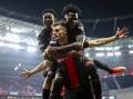 Josip Stanisic (C) scored a late equaliser for Leverkusen as they reached the Europa League final. (EPA PHOTO)