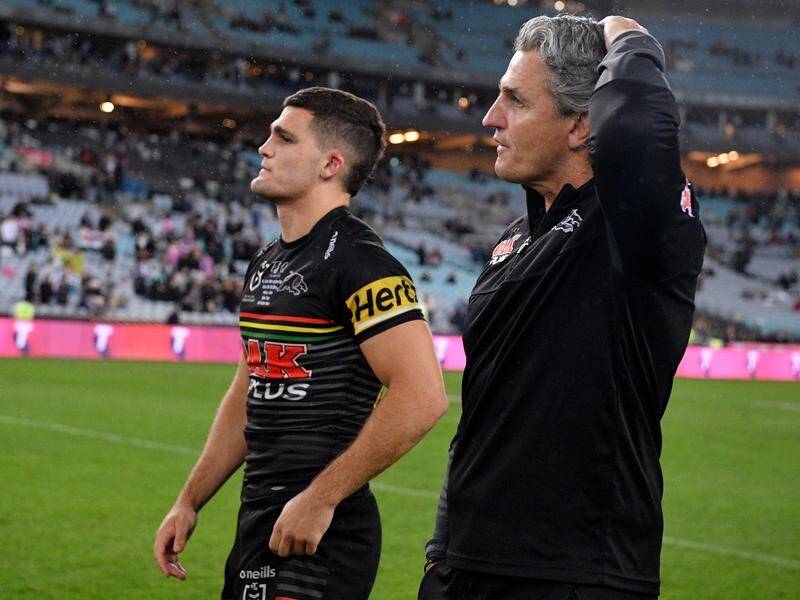 Penrith's Ivan Cleary (r) says he has no regrets resting his Origin stars, including son Nathan (l).