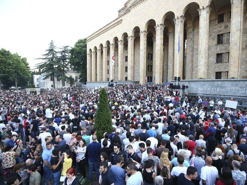 Opposition demonstrators gathered in front of the parliament in Tbilisi after a night of unrest.
