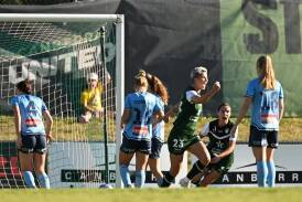 Canberra United's Michelle Heyman (No.23) turns to celebrate her goal that sank Sydney FC. (Lukas Coch/AAP PHOTOS)
