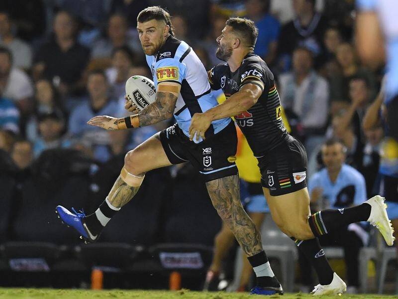 Josh Dugan (L) has scored the late winning try in Cronulla's 24-20 comeback NRL defeat of Penrith.