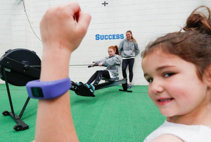 A study shows Fitbit use in children can have negative
impact on their self-esteem. But child fitness trainer and
mother Lauren Gilchrist believes theyre great for making
kids more active. 6 year old Madi and her sister Taylah, 10 love their fitness trackers. 3rd October 2017. Photo by Jason South