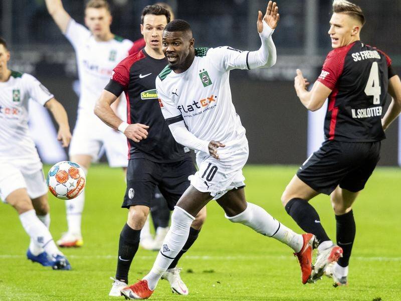 Freiburg, in the black shirts, could hardly believe their amazing 6-0 win over hapless Gladbach.