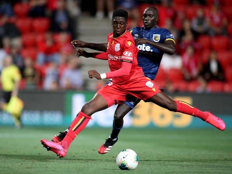 Adelaide United's Mohamed Toure has become the youngest goal-scorer in A-League history.