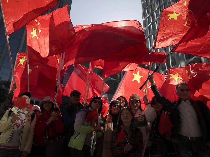 Pro-China supporters have held their rally ahead of another large pro-democracy march in Hong Kong.