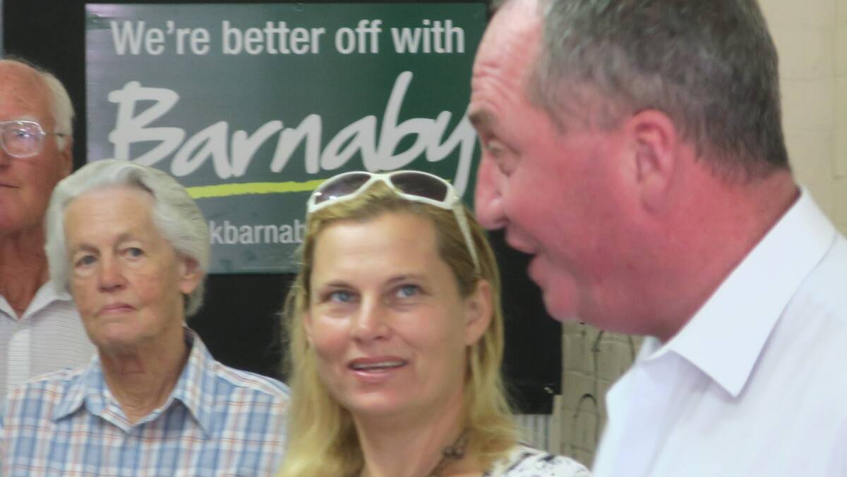 Barnaby Joyce talking to party workers during his election. Will they still love him tomorrow?