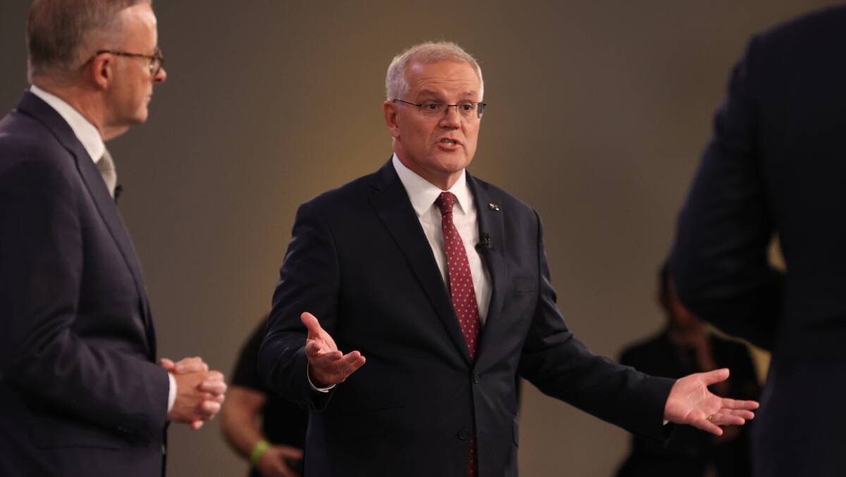 Scott Morrison apologised for an insensitive remark he made during the leaders' debate - but has dug in on supporting Liberal candidate Katherine Deves. Picture: AAP