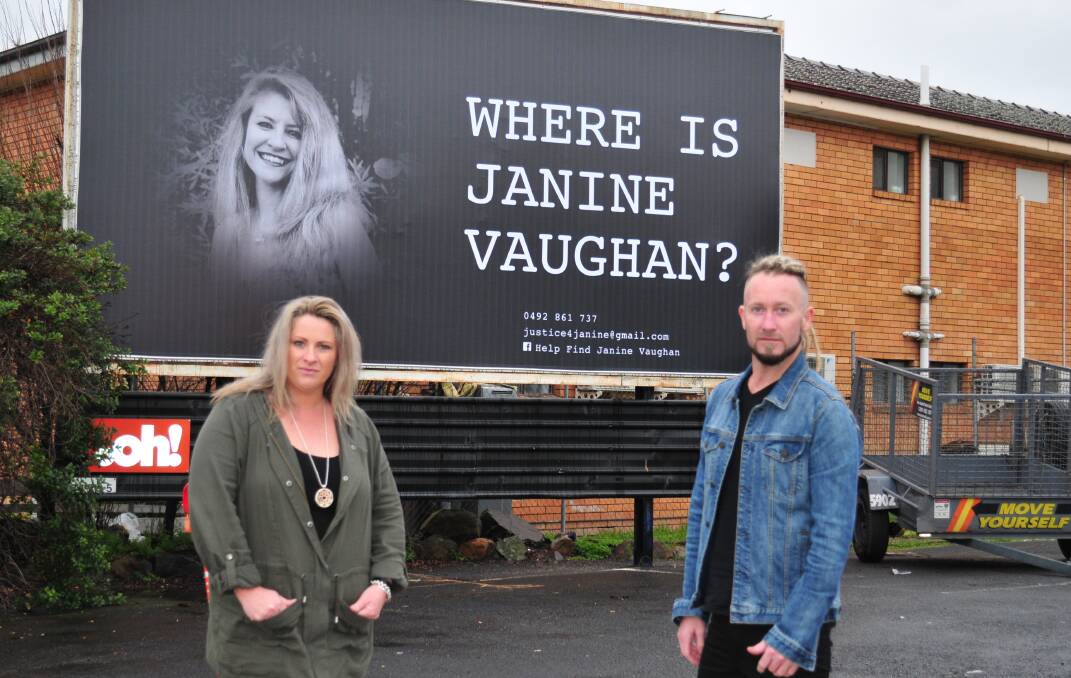 DO YOU KNOW: Janine Vaughan's sister, Kylie Spelde and brother, Adam Vaughan, stand near the billboard.