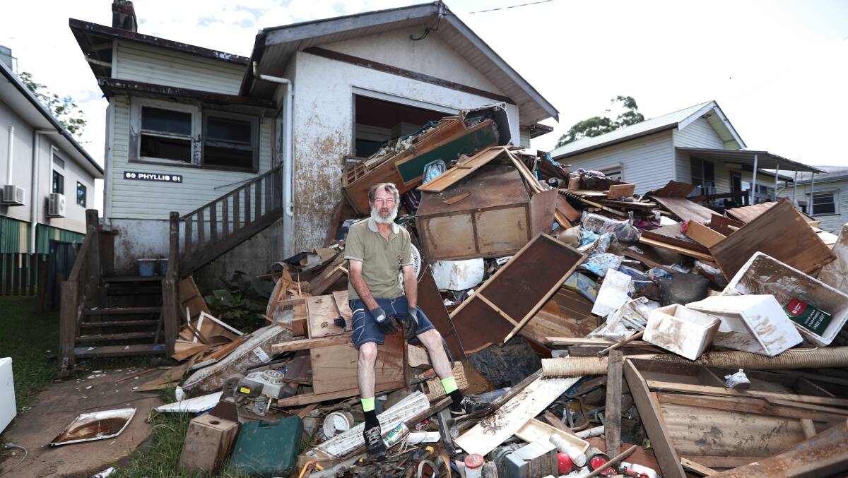 Ken Bridge outside his home in south Lismore, which has been devastated by the flooding crisis. Picture: AAP
