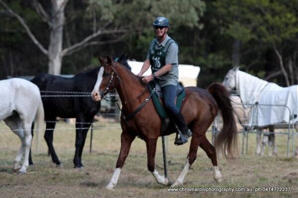 On home ground: Tenterfield Endurance Riding Club member Michael Combe gained first place in the 100km heavyweight division, riding NASR. (Photo courtesy of Christine Maroni of Boonah.) 